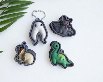 Lindo llavero fidget clicker de críptido / figura de animal impresa en 3D Nessie, hombre polilla, jackalope, lombriz de tierra, chuchería Fidget clicker kawaii