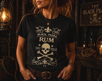 May include: Black t-shirt with a pirate-themed design. The shirt features the text "Black Pearl Rum" above a skull and crossbones graphic. Additional text includes "Pirate Grade" and "Made in Tortuga".