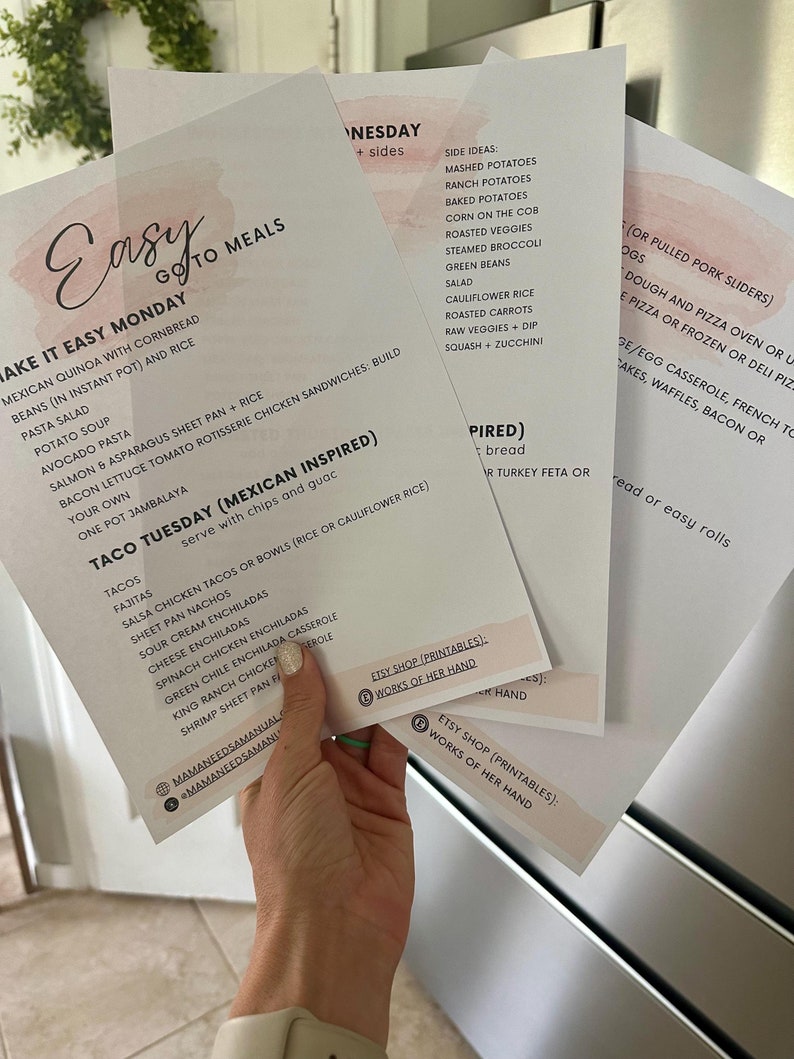 May include: Several printed meal plan sheets with a pink watercolour accent. The sheets list recipes for easy meals, including tacos, salads, and casseroles. The Etsy shop name is visible.