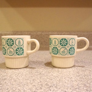 Vtg Pair Mugs, Turquoise Early American Style Graphics on White, Ceramic, Stackable, Vintage 1960s - 70s