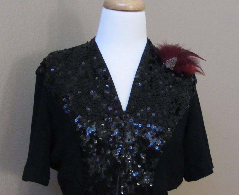 Vintage 1940s Women\u2019s Black Crepe Peplum Sequin Short Sleeve Top by Franklin Simon wRetro-Feathered Brooch in Burgundy and Black