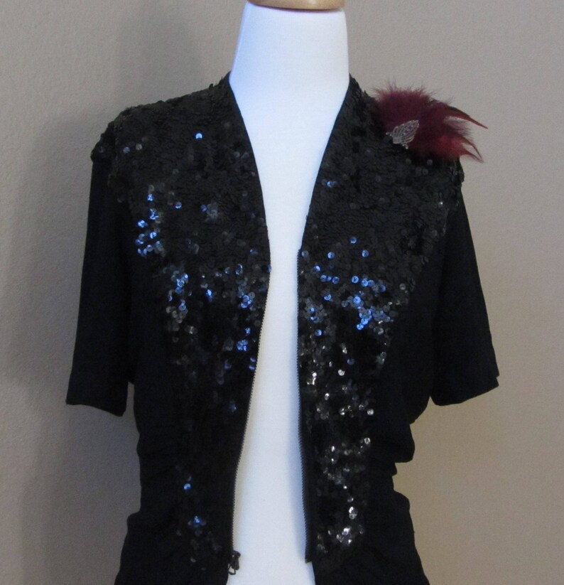Vintage 1940s Women\u2019s Black Crepe Peplum Sequin Short Sleeve Top by Franklin Simon wRetro-Feathered Brooch in Burgundy and Black