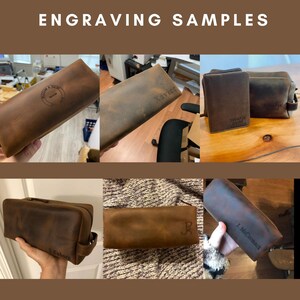 May include: A collection of brown leather toiletry bags with various personalized engravings. The bags are made of distressed leather and have a zipper closure. The engravings include names, initials, and the words "Swank Guide".