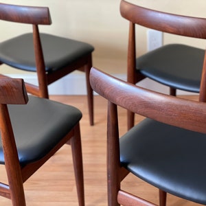 Set of Four Frem Rojle Chairs in Afrormosia and new Upholstery in black leather image 7