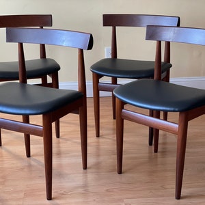 Set of Four Frem Rojle Chairs in Afrormosia and new Upholstery in black leather image 1