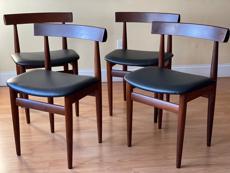 Set of Four Frem Rojle Chairs in Afrormosia and new Upholstery in black leather image 1