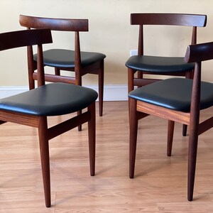 Set of Four Frem Rojle Chairs in Afrormosia and new Upholstery in black leather image 2