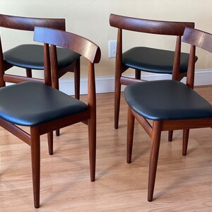 Set of Four Frem Rojle Chairs in Afrormosia and new Upholstery in black leather image 3