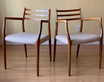 Two Møller Model #62 Armchairs, Designed by Niels Otto Møller, by J.L. Møllers Møbelfabrik, in rosewood and wool fabric