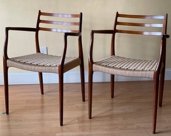 Two Møller Model #62 Armchairs, Designed by Niels Otto Møller, by J.L. Møllers Møbelfabrik, in rosewood Danish Paper Cord