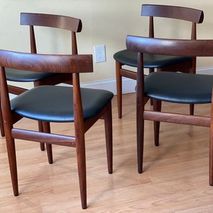 Set of Four Frem Rojle Chairs in Afrormosia and new Upholstery in black leather image 6