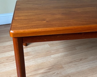 Danish teak coffee table, 25 by 48"