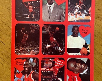 May include: A sheet of stickers featuring a basketball player with different Valentine's Day themed messages. The stickers feature the text "Michael Jordan" and "Jump Inc."