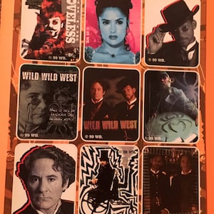 May include: A sheet of stickers featuring characters and scenes from the movies "Wild Wild West" and "Loveless". The stickers are on a brown background with a gold border. The text "Wild Wild West" and "Loveless" are visible on the stickers.