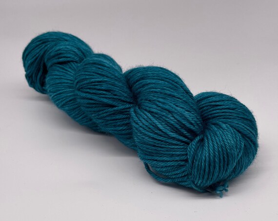 Baby peacock - teal hand-dyed semi-solid superwash DK (8 ply) merino yarn - 100g (225m)