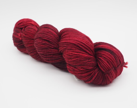 Claret - tonal red hand-dyed semi-solid superwash DK (8 ply) merino yarn - 100g (225m)