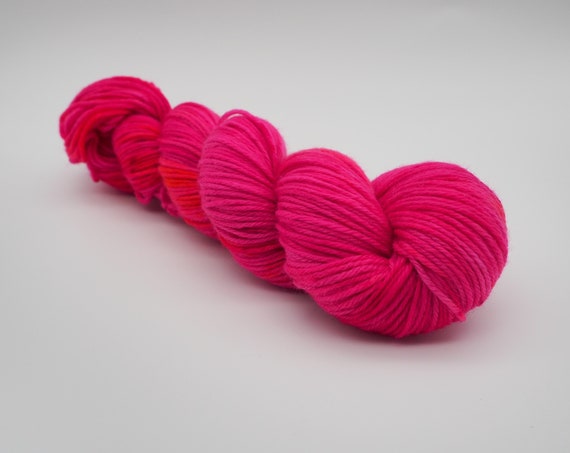 Power Suit - fluro pink peach speckled hand-dyed variegated superwash DK (8 ply) merino yarn - 100g (225m)