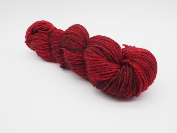 After party - tonal red hand-dyed semi-solid superwash DK (8 ply) merino yarn - 100g (225m)