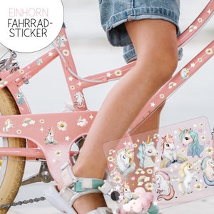 May include: A pink bicycle with unicorn stickers. The stickers are on the frame and the wheels. The stickers are colourful and feature rainbows, stars, and flowers. The bicycle is being ridden by a child.