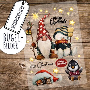 Könnte beinhalten: Bügelbild mit Weihnachtsmotiv, auf dem ein Zwerg, ein Schneemann, ein Pinguin sowie ein Fuchs, ein Kaninchen und ein Waschbär unter einem Weihnachtsmann-Hut zu sehen sind. Das Bügelbild enthält den Text "Merry Christmas" an mehreren Stellen.