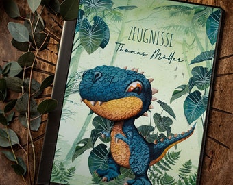 Può includere: Un raccoglitore verde e blu con un'illustrazione di dinosauro di cartone animato e il testo "Zeugnisse Thomas Müller".