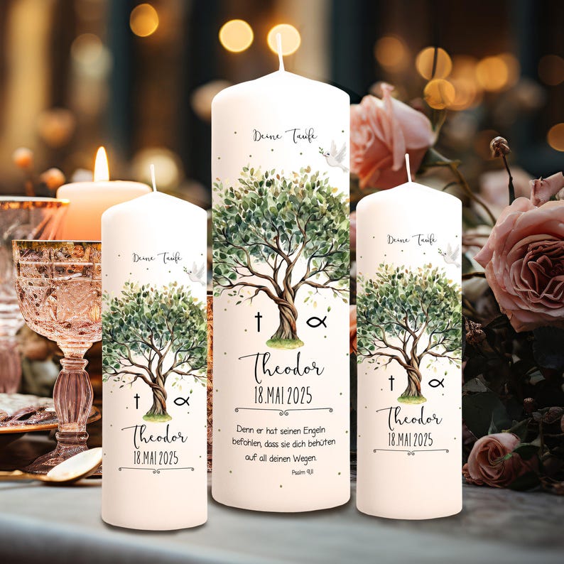 May include: Three white pillar candles with a watercolor design of a tree with green leaves and a dove. The candles are decorated with the text "Deine Taufe" and "Theodor 18.MAI 2025".