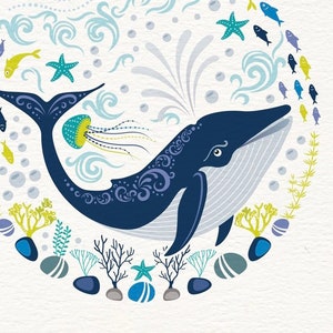 Close up section of my colourful Blue whale greeting card in our circular Nordic folk art style. It features a whale in deep blue, followed by a shoal of little fishes , pebbles, coral and jelly fish in bright contemporary coastal colours.