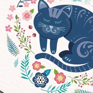 Close up of my colourful Cat illustration in my circular Nordic folk art style. It features a sleeping cat surrounded by flowers, ferns and leaves in  blues, pinks and turquoise.