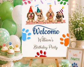 May include: A rectangular birthday party sign featuring four puppies in colorful party hats sitting on a red and white checkered banner. The text reads Welcome William's Birthday Party, surrounded by colorful paw prints and sprinkles on a white background.