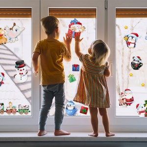 Adesivi per finestre Kit decorativo di Natale per vetri Trenino Pinguini albero di natale regali decorazione finestre natale