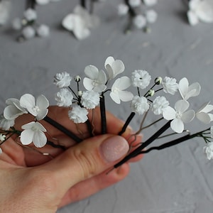 Small white flowers bridal hair pins