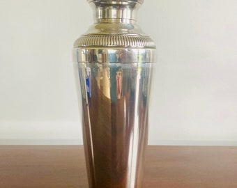Fabulous French Art Deco silver plate cylindrical cocktail or Martini shaker by silversmith Noel Collet,  Paris.