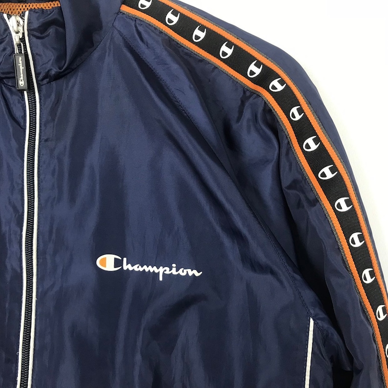 Vintage CHAMPION Jacket Spellout Big Logo Side Tape Design Sportwear Nice Design Multicolour Sweater Retro Rap tees Hip Hop Swag Rare !!