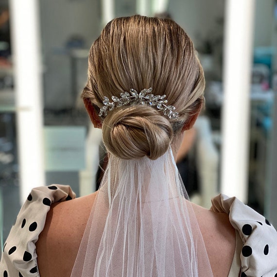 High bun wedding hairstyles are always so elegant & classy. They compliment  facial features & give such a timeless look. It's the perfe... | Instagram