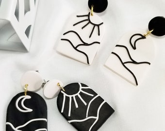 Sun and Moon Earrings, black and white clay mountain earrings, dangle mismatched earrings Day and Night