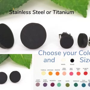 May include: Black round stud earrings made of stainless steel or titanium. Choose your color and size from a variety of options, including white, black, vanilla, mustard, orange, pink coral, hot pink, coral red, scarlet red, dark red, light purple, dark purple, magenta, jade, olive, emerald, teal turquoise, denim blue, and classic blue.