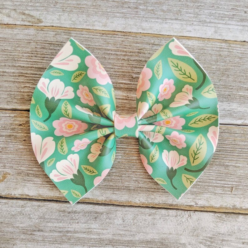 Floral leather bows