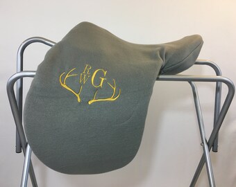 May include: Grey saddle pad with embroidered antlers and the initials "RWG".