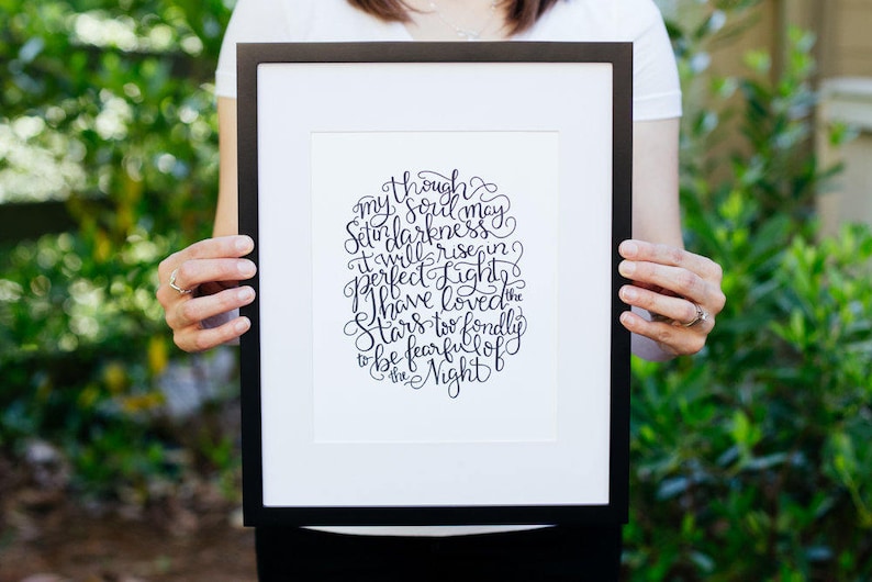 May include: A framed print with a black background and white lettering. The text reads "Though my soul may set in darkness it will rise in perfect light. I have loved the stars too fondly to be fearful of the night."