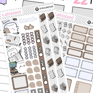 May include: A set of printable planner stickers featuring a book theme. The stickers are in brown, white, and black with illustrations of books, stars, hearts, and a marshmallow character. The stickers include a "this week" banner, a "to do" list, and daily boxes for Monday through Friday.