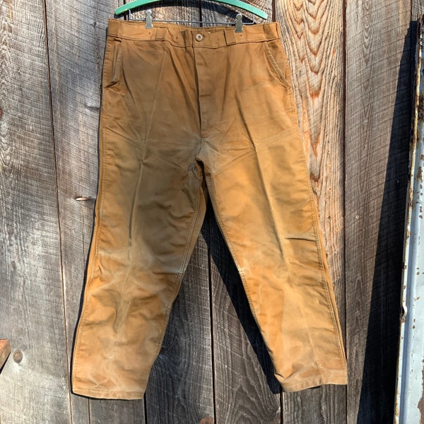 1960’s vintage CARHARTT x SUPERDUX duck canvas 38x29 brown HUNTING pants double Knee 100% Cotton with Vinyl Coating Distressed