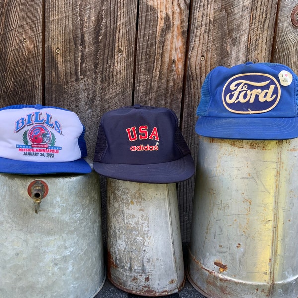 Vintage Trucker Snap back Baseball Caps, New Era Buffalo Bills Super Bowl XXVI SnapBack Hat, Adidas Olympics Hat, Ford Hat, Old Trucks