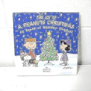 Hallmark the joy of A PEANUTS CHRISTMAS 50 years of holiday comics, HB 2000
