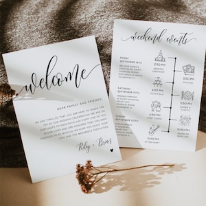May include: A wedding invitation with a white background and black text. The invitation includes a welcome message, a list of weekend events, and the couple's names, Riley and Brian. The events include a wedding ceremony, dinner, cocktails, a first dance, and a sparkler send-off.