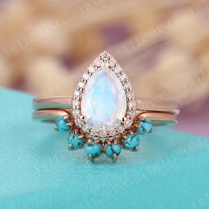 Conjunto de anillo de compromiso de piedra lunar Conjunto de anillo de oro rosa Conjunto de anillo de halo de diamantes en forma de pera Conjunto de alianza de boda turquesa curvada Anillo de aniversario