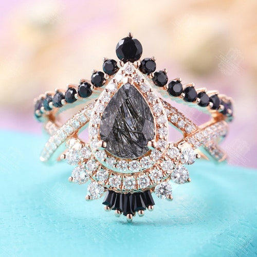 Rhodium Plated Pear Black Onyx Charm