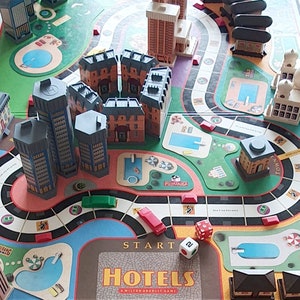 Milton Bradley HOTELS 1987 edition | 3-dimensional Board Game with Miniature Hotel Buildings | 2 to 4 Players, Ages 8 & Up | 100% complete