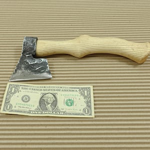 A small forest axe. A gift for a real man. Hand-forged for hikes in the woods