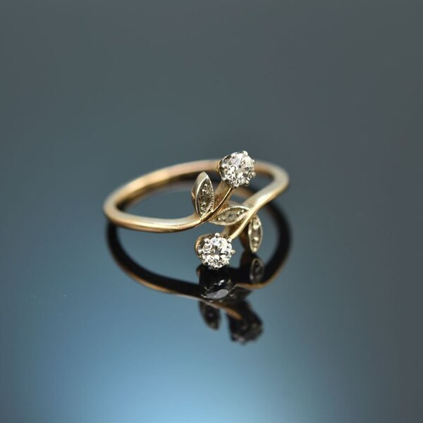 Antique Art Nouveau ring with diamonds made of gold 585 created around 1905 toi et moi