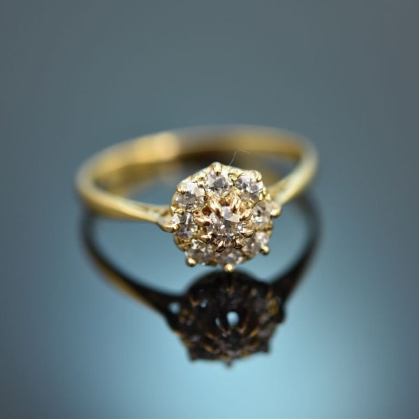 Belle bague marguerite avec diamants taille européenne d'environ 0,45 ct en or 750 Angleterre vers 1910